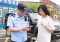 【高考暖心事】考生证件遗落正着急 民警紧急接送真给力
